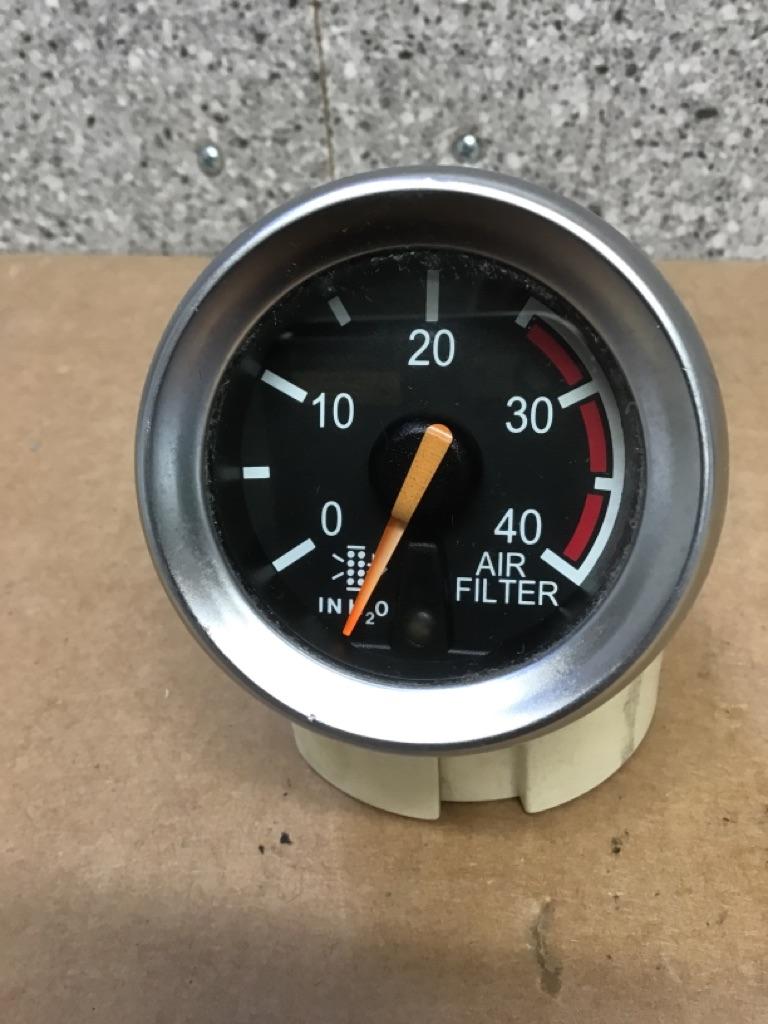 Peterbilt 17-05065-016E air filter restriction gauge (silver trim, 2 in.) from 2004 Peterbilt 387, used