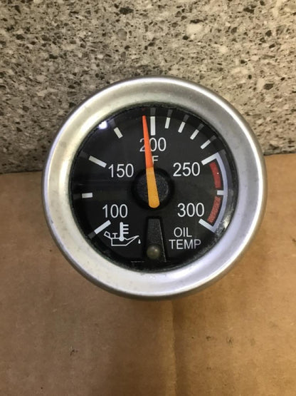 Peterbilt Q43-6013-002E oil temperature gauge (silver bezel) from 2005 Peterbilt 387, used